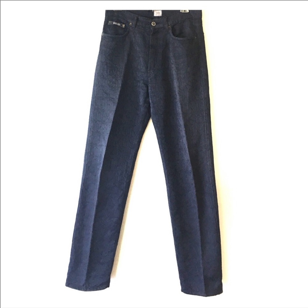 Moschino jeans with the peace sign all over it.